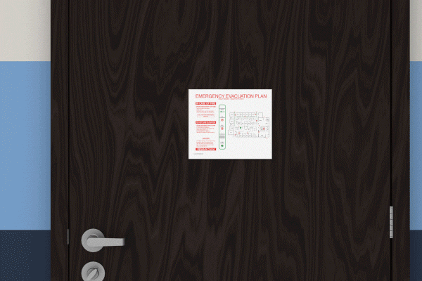 An animation showing a fire evacuation map mounted on the back of a door as a hotel guest moves through the hall to the stairwell.
