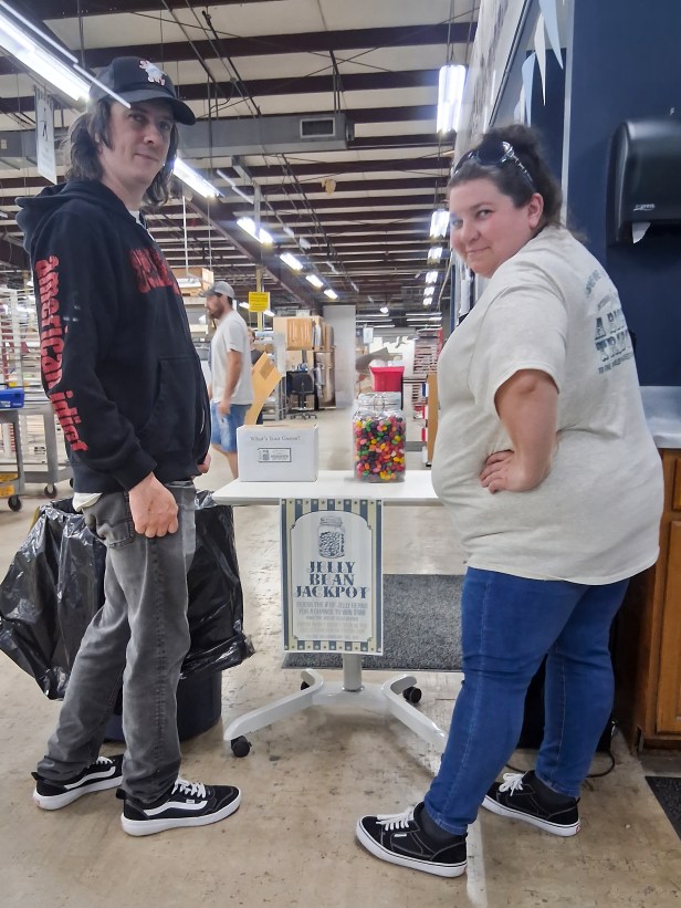 Gerald Lams and Michelle Roberts consider the number of candies to enter the Jellybean Jackpot.