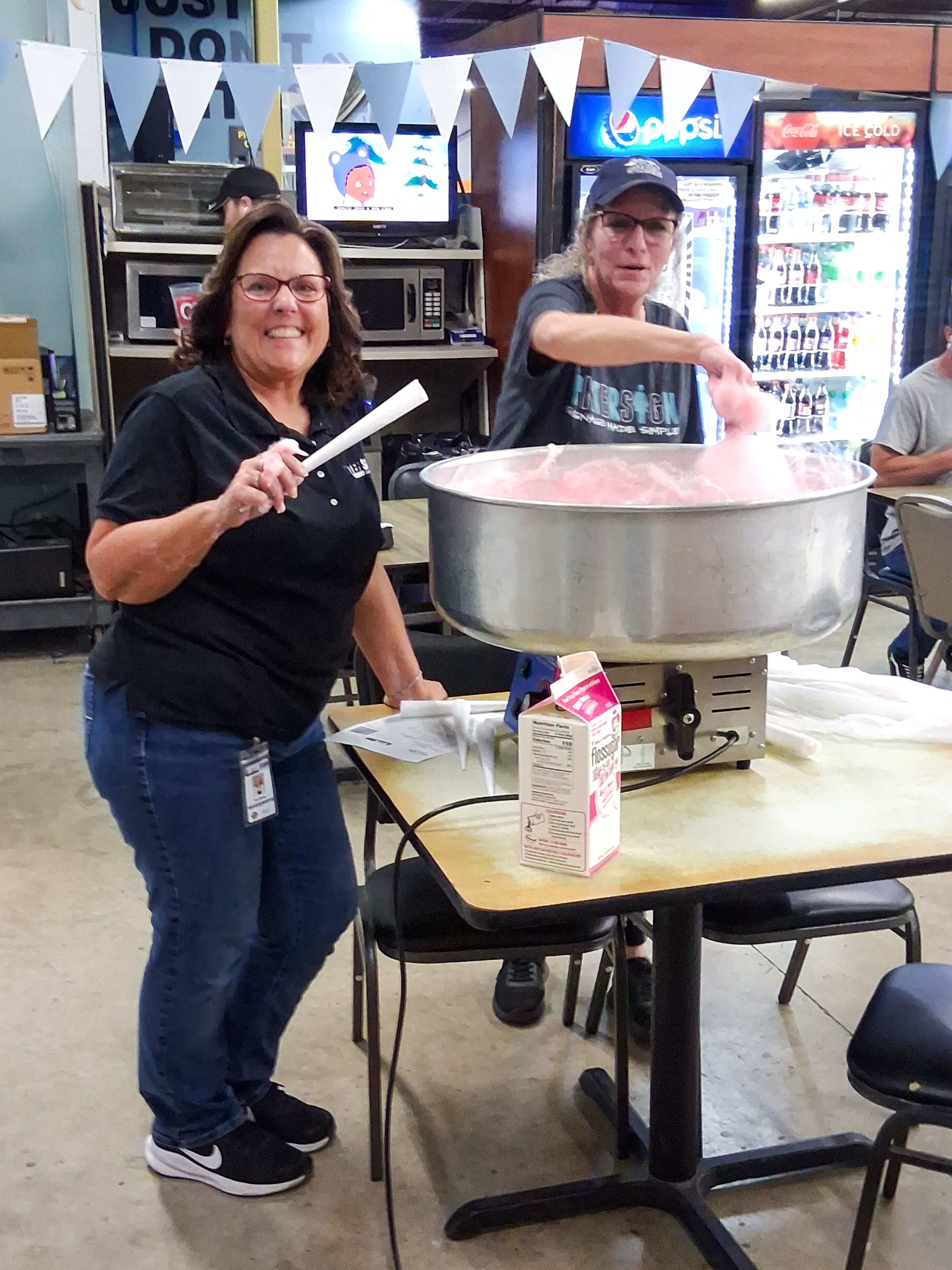 Tina and Liz expertly prepare fresh cotton candy for employees during our Bigtop Appreciation Week celebration.