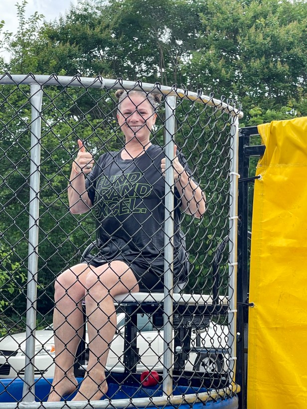 Amy Smith gives a cheerful thumbs-up from the dunk tank, adding to the fun of our appreciation week.