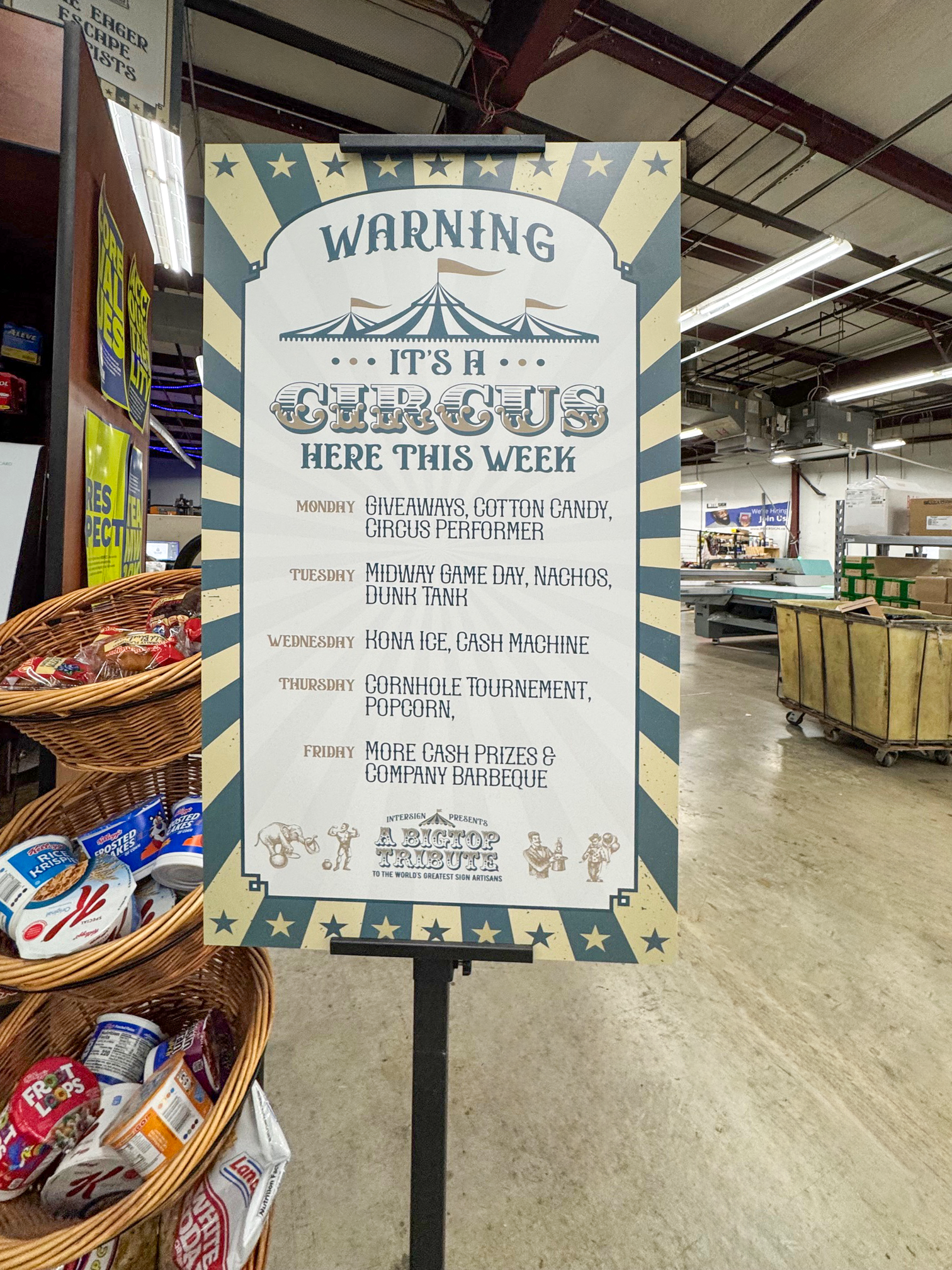 A vibrant circus-themed poster announces “Warning: It's a Circus Here This Week," detailing the fun activities for Employee Appreciation Week.