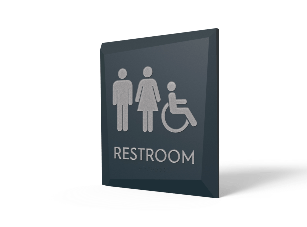Facets collection ADA-compliant restroom sign in Colonial Blue, highlighting dimensional acrylic depth and clear contrast to improve visibility and meet ADA and fire code standards.