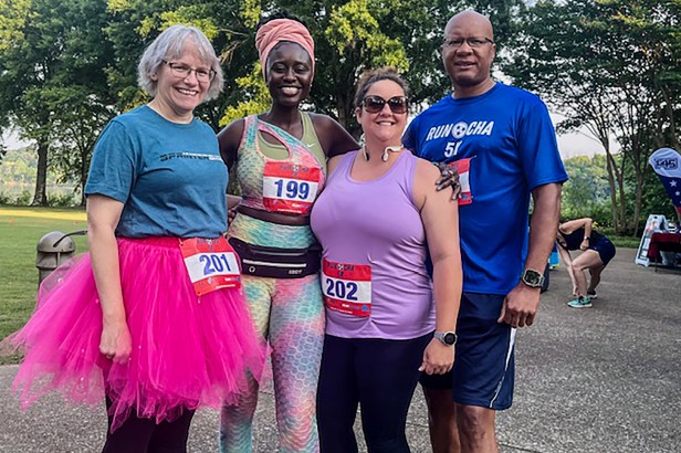 EvacuationPlans.com staff joining a local charity run to promote community wellness and support local causes.