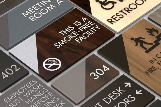 Collage of Incline Style safety and facility signs, including room numbers, restroom icons, smoke-free notices, handwashing reminders, fire safety graphics, and directional arrows.